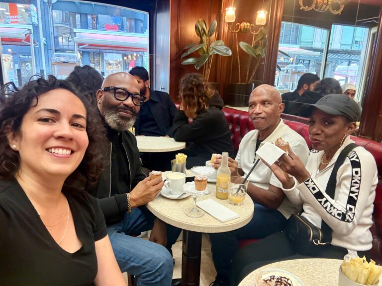 Friends sharing coffee at a café table
